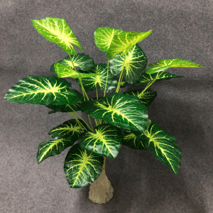 Planta artificial amarilla alocasia